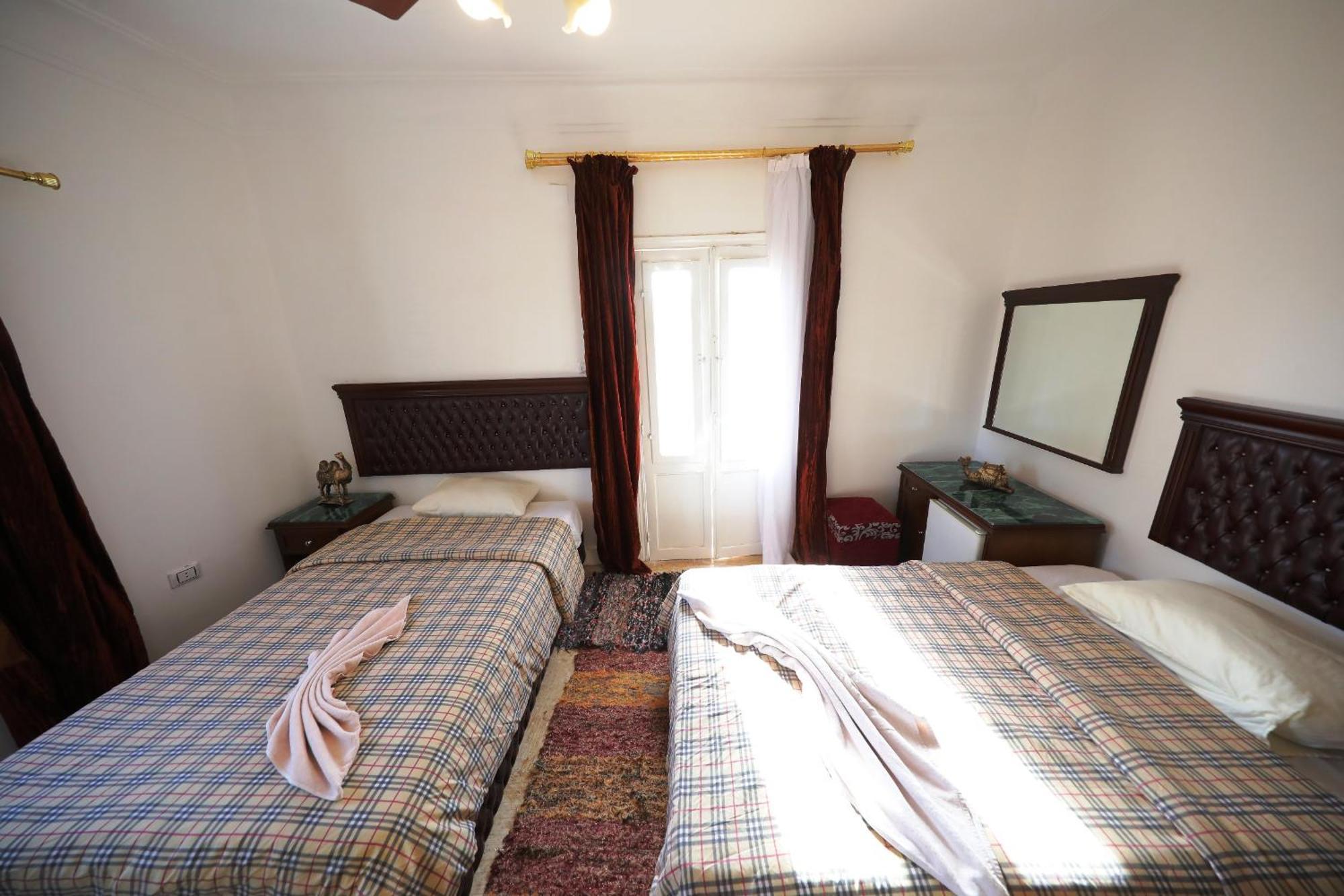 Pyramids Loft Guesthouse Каир Номер фото